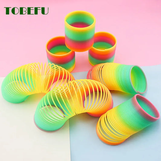 Funny Creative Magical Folding Toys Plastic Rainbow Circle Slinky Spring Coil for Children Early Development Educational